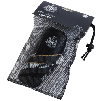 Newcastle United детски протектори Black fuse design - 7 to 9 years (120cm)